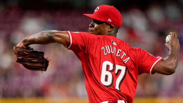 Cincinnati Reds relief pitcher Yosver Zulueta (67) throws a pitch in the sixth inning of the MLB National League game between the Cincinnati Reds and the Pittsburgh Pirates at Great American Ball Park on Tuesday, June 25, 2024. The Pirates won the second game of the series, 9-5.