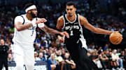 Oct 22, 2025; Dallas, Texas, USA;   San Antonio Spurs forward Victor Wembanyama (1) drives to the basket as Dallas Mavericks forward Anthony Davis (3) defends