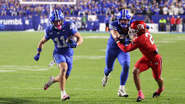 Oct 18, 2025; Provo, Utah, USA; BYU Cougars wide receiver Parker Kingston (11) runs for a touchdown against the Utah Utes during the second half at LaVell Edwards Stadium. Mandatory Credit: Rob Gray-Imagn Images