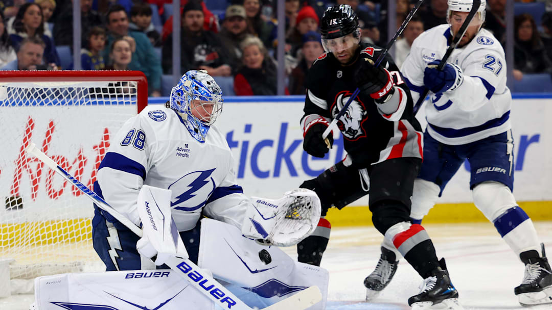 Apr 6, 2026; Buffalo, New York, USA;  Buffalo Sabres left wing Jason Zucker (17) watches as Tampa Bay Lightning goaltender Andrei Vasilevskiy (88) makes a save during the second period at KeyBank Center. Mandatory Credit: Timothy T. Ludwig-Imagn Images