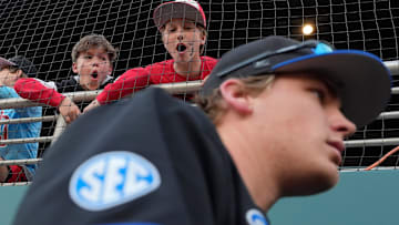 Some young Georgia fans bark at Kentucky players as they enter the dugout during a NCAA baseball game against Kentucky on March 14, 2025.