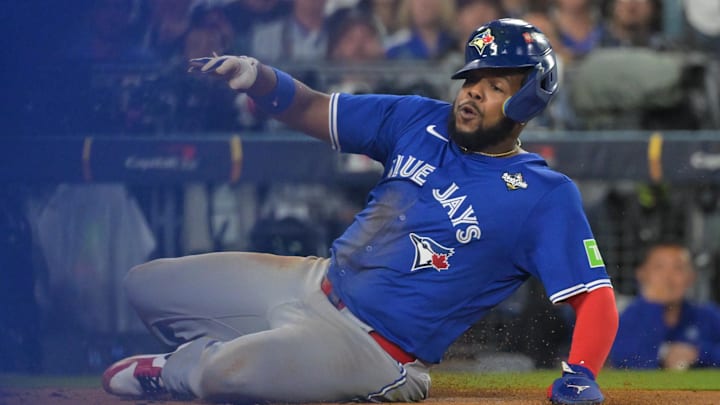 Toronto Blue Jays first baseman Vladimir Guerrero Jr. slid into home plate to score the go-ahead run in Game 3 of the 2025 World Series. Toronto Blue Jays first baseman Vladimir Guerrero Jr. slid into home plate to score the go-ahead run in Game 3 of the 2025 World Series.