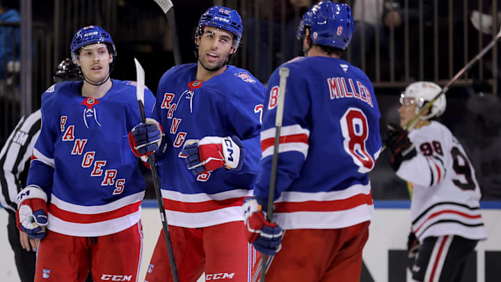 Mar 27, 2026; New York, New York, USA; New York Rangers defenseman Matthew Robertson (29) celebrates his goal against the Chicago Blackhawks with left wing Tye Kartye (24) and left wing J.T. Miller (8) during the second period at Madison Square Garden. 