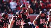 Utah Utes quarterback Byrd Ficklin (15) had over 500 rushing yards and scored 10 rushing touchdowns as a freshman.