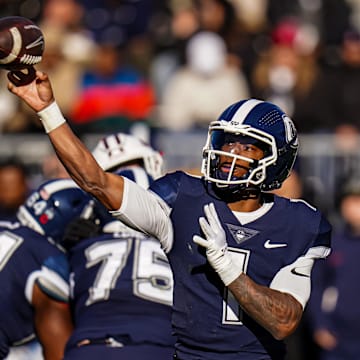 Nov 18, 2023; East Hartford, Connecticut, USA; UConn Huskies quarterback Ta'Quan Roberson (1) throws a pass against the Sacred Heart Pioneers in the second quarter at Rentschler Field at Pratt & Whitney Stadium. Mandatory Credit: David Butler II-USA TODAY Sports