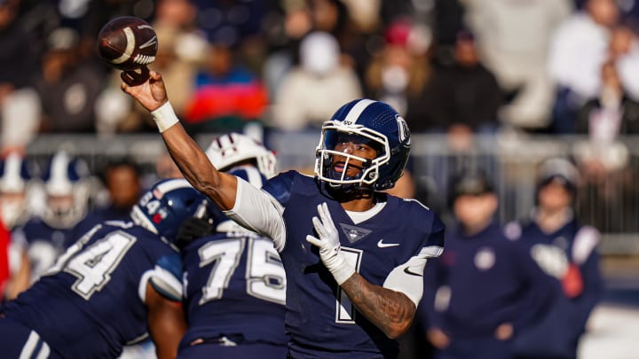 Nov 18, 2023; East Hartford, Connecticut, USA; UConn Huskies quarterback Ta'Quan Roberson (1) throws a pass against the Sacred Heart Pioneers in the second quarter at Rentschler Field at Pratt & Whitney Stadium. Mandatory Credit: David Butler II-USA TODAY Sports