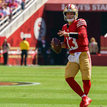 Sep 29, 2024; Santa Clara, California, USA; San Francisco 49ers quarterback Brock Purdy (13) prepares to pass the football against the New England Patriots during the first quarter at Levi's Stadium. Mandatory Credit: Neville E. Guard-Imagn Images