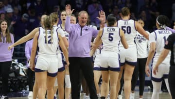 Mar 22, 2024; Manhattan, KS, USA; Kansas State Wildcats head coach Jeff Mittie congratulates his team as they come off the court during a timeout in the fourth quarter against the Portland Pilots at Bramlage Coliseum. Mandatory Credit: Scott Sewell-USA TODAY Sports