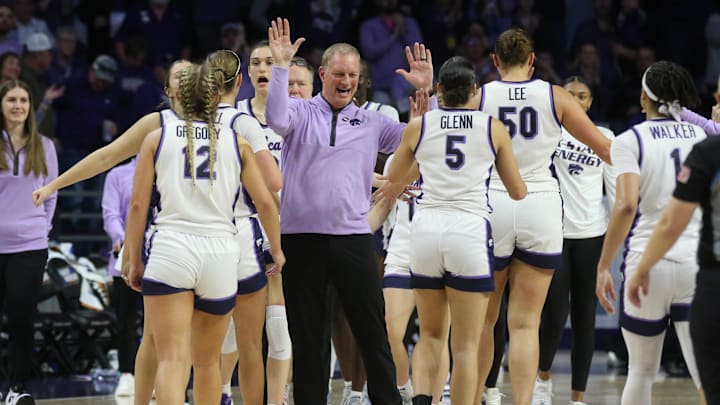 Mar 22, 2024; Manhattan, KS, USA; Kansas State Wildcats head coach Jeff Mittie congratulates his team as they come off the court during a timeout in the fourth quarter against the Portland Pilots at Bramlage Coliseum. Mandatory Credit: Scott Sewell-USA TODAY Sports