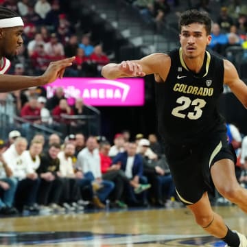Colorado Buffaloes forward Tristan da Silva (23) dribbles against the Washington State Cougars during the first half at T-Mobile Arena.