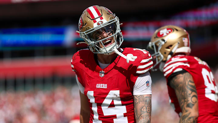 Nov 10, 2024; Tampa, Florida, USA; San Francisco 49ers wide receiver Ricky Pearsall (14) celebrates after scoring a touchdown against the Tampa Bay Buccaneers in the first quarter at Raymond James Stadium. Mandatory Credit: Nathan Ray Seebeck-Imagn Images