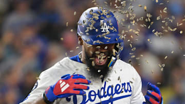 Sep 30, 2025; Los Angeles, California, USA; Los Angeles Dodgers right fielder Teoscar Hernandez (37) celebrates after hitting a home run during the fifth inning against the Cincinnati Reds during game one of the Wildcard round for the 2025 MLB playoffs at Dodger Stadium. Mandatory Credit: Jayne Kamin-Oncea-Imagn Images