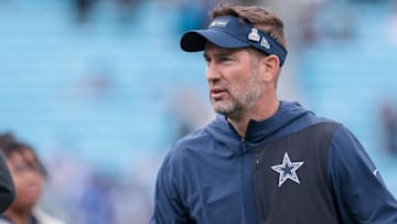 Oct 12, 2025; Charlotte, North Carolina, USA; Dallas Cowboys head coach Brian Schottenheimer looks on before the game against the Carolina Panthers at Bank of America Stadium.