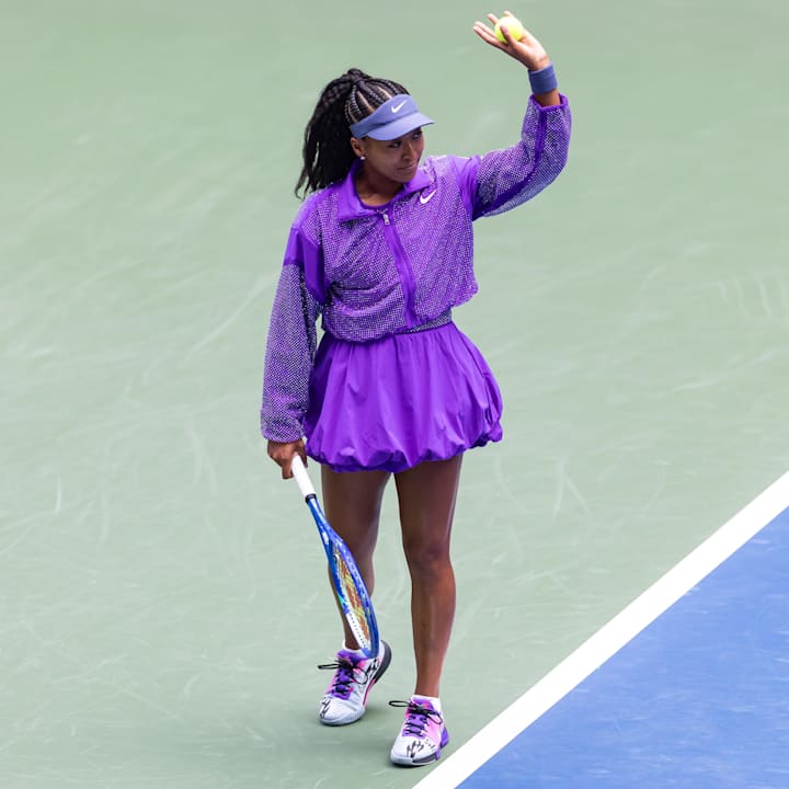Naomi Osaka warms up before her match against Hailey Baptiste in the second round of the women’s singles at the US Open 