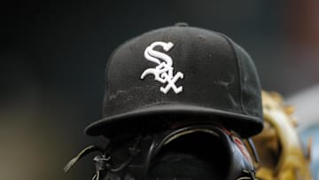 Apr 3, 2012; Houston, TX, USA; Detail view of a Chicago White Sox hat and glove on the bench before a game against the Houston Astros at Minute Maid Park. Mandatory Credit: Brett Davis-Imagn Images