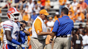 September 20, 2008;  Knoxville, TN, USA;  Tennessee Volunteers head coach Philip Fulmer (left) and Florida Gators head coach Urban Meyer shake hands before the game at Neyland Stadium. Mandatory Credit: Dale Zanine- Imagn Images