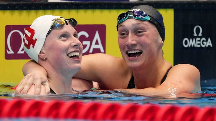 Lilly King, left, celebrates with Emma Weber after winning the 100-meter breaststroke final during the U.S. Olympic Trials. Weber also qualified for the Games in the event.