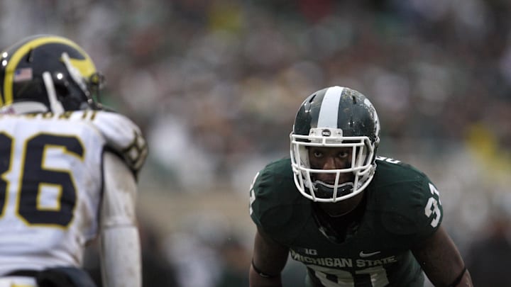 Nov 2, 2013; East Lansing, MI, USA; Michigan State Spartans cornerback Darqueze Dennard (31) looks at Michigan Wolverines wide receiver Jehu Chesson (86) during the third quarter at Spartan Stadium. Spartans beat the Wolverines 29-6. Mandatory Credit: Raj Mehta-Imagn Images