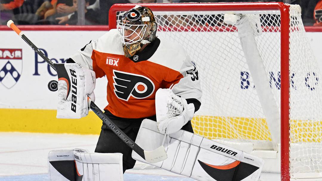 Oct 3, 2026; Philadelphia, Pennsylvania, USA; Philadelphia Flyers goaltender Joseph Woll (53) makes a save against the Carolina Hurricanes during the first period at Xfinity Mobile Arena.