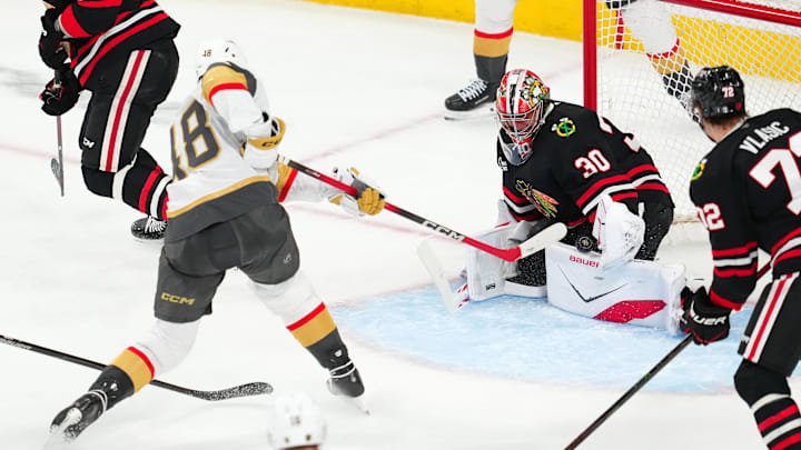 Mar 14, 2026; Las Vegas, Nevada, USA; Chicago Blackhawks goaltender Spencer Knight (30) makes a save against Vegas Golden Knights center Tomas Hertl (48) during the third period at T-Mobile Arena. Mandatory Credit: Stephen R. Sylvanie-Imagn Images