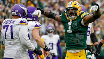 Green Bay Packers edge rusher Micah Parsons celebrates a sack of  Vikings quarterback J.J. McCarthy. 