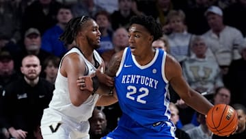 Kentucky Wildcats center Amari Williams (22) is guarded by Vanderbilt Commodores forward Devin McGlockton (99) during their game at Memorial Gym in Nashville, Tenn., Thursday, Aug. 29, 2024.