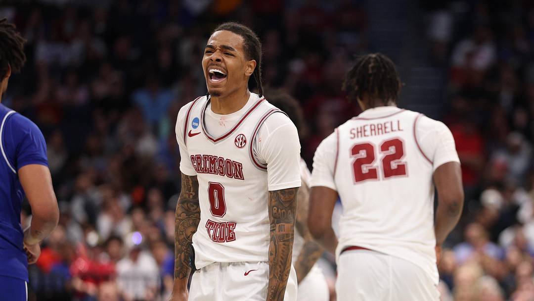 Mar 20, 2026; Tampa, FL, USA; Alabama Crimson Tide guard Labaron Philon (0) reacts after a play in the first half against the Hofstra Pride during a first round game of the men's 2026 NCAA Tournament at Benchmark International Arena. Mandatory Credit: Nathan Ray Seebeck-Imagn Images