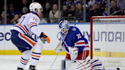 Oct 14, 2025; New York, New York, USA; Edmonton Oilers center Trent Frederic (10) scores a goal against New York Rangers goaltender Igor Shesterkin (31) during the second period at Madison Square Garden. Mandatory Credit: Brad Penner-Imagn Images