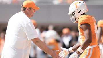 Tennessee coach Josh Heupel high-fives a player before a college football game between Tennessee and UAB at Neyland Stadium in Knoxville, Tenn., on Sept. 20, 2025.