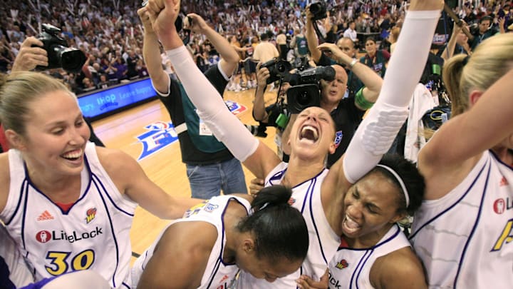 The Phoenix Mercury's Diana Taurasi (3) celebrates with her teammates after defeating the Indiana Fever to win the WNBA Finals at US Airways Center on Oct. 9, 2009. The Phoenix Mercury's Diana Taurasi (3) celebrates with her teammates after defeating the Indiana Fever to win the WNBA Finals at US Airways Center on Oct. 9, 2009.