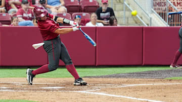 Freshman catcher Kendall Wells hits a home run during a fall exhibition game against Oklahoma Christian University at Love’s Field on Oct. 15 in Norman, Okla.