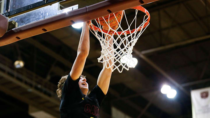 Logan-Rogersville's Chase Branham dunks the ball as the Wildcats took on the Sparta Trojans at Hammons Student Center in a first round Blue Division matchup during the Blue and Gold Tournament on Thursday, Dec. 26, 2024.
