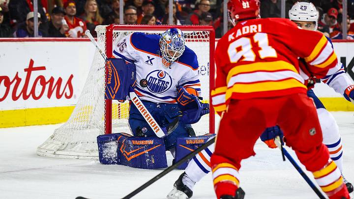 Feb 4, 2026; Calgary, Alberta, CAN; Edmonton Oilers goaltender Tristan Jarry (35) makes a save against the Calgary Flames during the second period at Scotiabank Saddledome. Mandatory Credit: Sergei Belski-Imagn Images