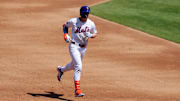 Apr 23, 2025; New York City, New York, USA; New York Mets second baseman Brett Baty (7) rounds the bases after hitting a two run home run against the Philadelphia Phillies during the second inning at Citi Field. Mandatory Credit: Brad Penner-Imagn Images
