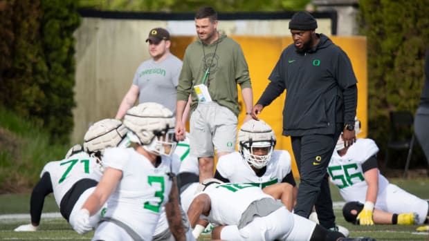 Oregon Ducks Coach Dan Lanning and A'lique Terry