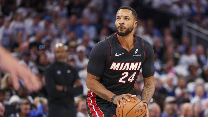 Oct 22, 2025; Orlando, Florida, USA; Miami Heat guard Norman Powell (24) shoots the ball against the Orlando Magic in the first quarter at Kia Center. Mandatory Credit: Nathan Ray Seebeck-Imagn Images