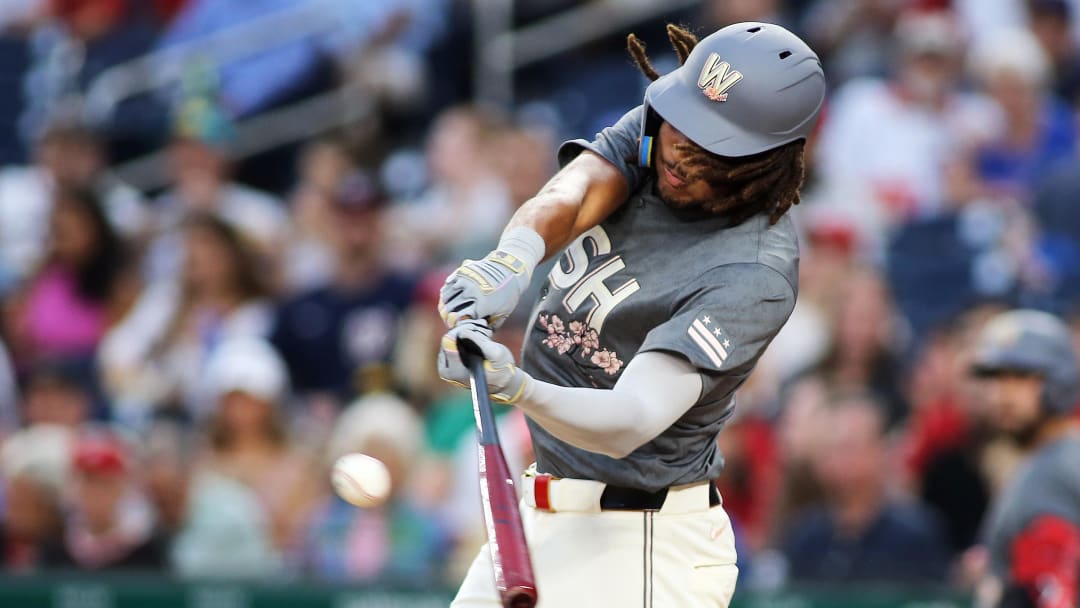 Aug 30, 2024; Washington, District of Columbia, USA; Washington Nationals left fielder James Wood (29) singles during the first inning against the Chicago Cubs at Nationals Park. 