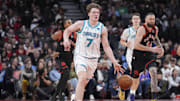 Dec 5, 2025; Toronto, Ontario, CAN; Charlotte Hornets guard Kon Knueppel (7) dribbles up court against the Toronto Raptors during the second half at Scotiabank Arena. Mandatory Credit: John E. Sokolowski-Imagn Images