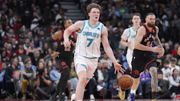 Dec 5, 2025; Toronto, Ontario, CAN; Charlotte Hornets guard Kon Knueppel (7) dribbles up court against the Toronto Raptors during the second half at Scotiabank Arena. Mandatory Credit: John E. Sokolowski-Imagn Images