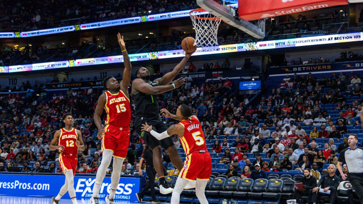 Nov 4, 2023; New Orleans, Louisiana, USA;  New Orleans Pelicans forward Zion Williamson (1) drives to the basket against Atlanta Hawks guard Dejounte Murray (5) during the second half at Smoothie King Center. 