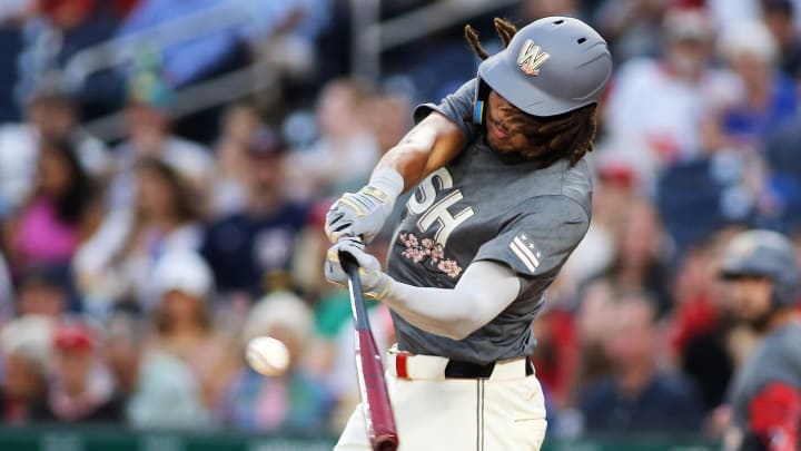 Aug 30, 2024; Washington, District of Columbia, USA; Washington Nationals left fielder James Wood (29) singles during the first inning against the Chicago Cubs at Nationals Park.