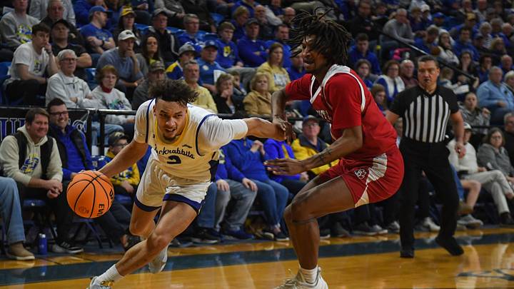 SDSU guard Zeke Mayo (2) drives the ball on Sunday, Feb. 4, 2024 at Frost Arena in Brookings.
