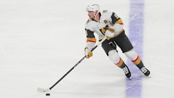 Jan 7, 2025; San Jose, California, USA; Vegas Golden Knights center Jack Eichel (9) skates with the puck against the San Jose Sharks during the third period at SAP Center at San Jose. Mandatory Credit: Darren Yamashita-Imagn Images