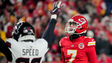 Dec 7, 2025; Kansas City, Missouri, USA; Kansas City Chiefs place kicker Harrison Butker (7) reacts after missing a field goal as Houston Texans cornerback Ameer Speed (37) celebrates during the second quarter at GEHA Field at Arrowhead Stadium. Mandatory Credit: Denny Medley-Imagn Images