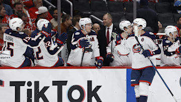 Apr 13, 2025; Washington, District of Columbia, USA; Columbus Blue Jackets left wing Dmitri Voronkov (10) celebrates with teammates after scoring a goal against the Washington Capitals in the third period at Capital One Arena. Mandatory Credit: Geoff Burke-Imagn Images