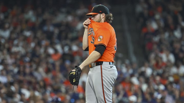 Jun 22, 2024; Houston, Texas, USA; Baltimore Orioles starting pitcher Corbin Burnes (39) reacts after a pitch during the seventh inning against the Houston Astros at Minute Maid Park.