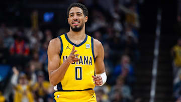 Nov 10, 2024; Indianapolis, Indiana, USA; Indiana Pacers guard Tyrese Haliburton (0) celebrates a made basket in the first quarter against the New York Knicks at Gainbridge Fieldhouse. Mandatory Credit: Trevor Ruszkowski-Imagn Images