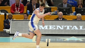 Apr 5, 2025; San Antonio, TX, USA; Duke Blue Devils guard Kon Knueppel (7) reacts after a play against the Houston Cougars during the first half in the semifinals of the men's Final Four of the 2025 NCAA Tournament at Alamodome. Mandatory Credit: Scott Wachter-Imagn Images
