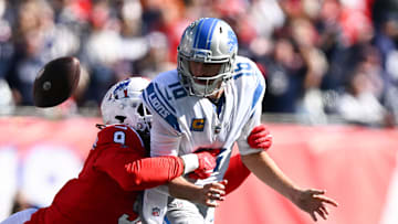 Oct 9, 2022; Foxborough, Massachusetts, USA; New England Patriots linebacker Matthew Judon (9) strip sacks Detroit Lions quarterback Jared Goff (16) during the first half at Gillette Stadium. Mandatory Credit: Brian Fluharty-Imagn Images