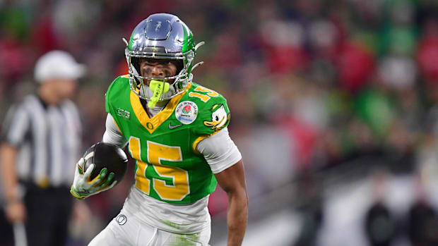 Jan 1, 2025; Pasadena, CA, USA; Oregon Ducks wide receiver Tez Johnson (15) runs against the Ohio State Buckeyes in the secon
